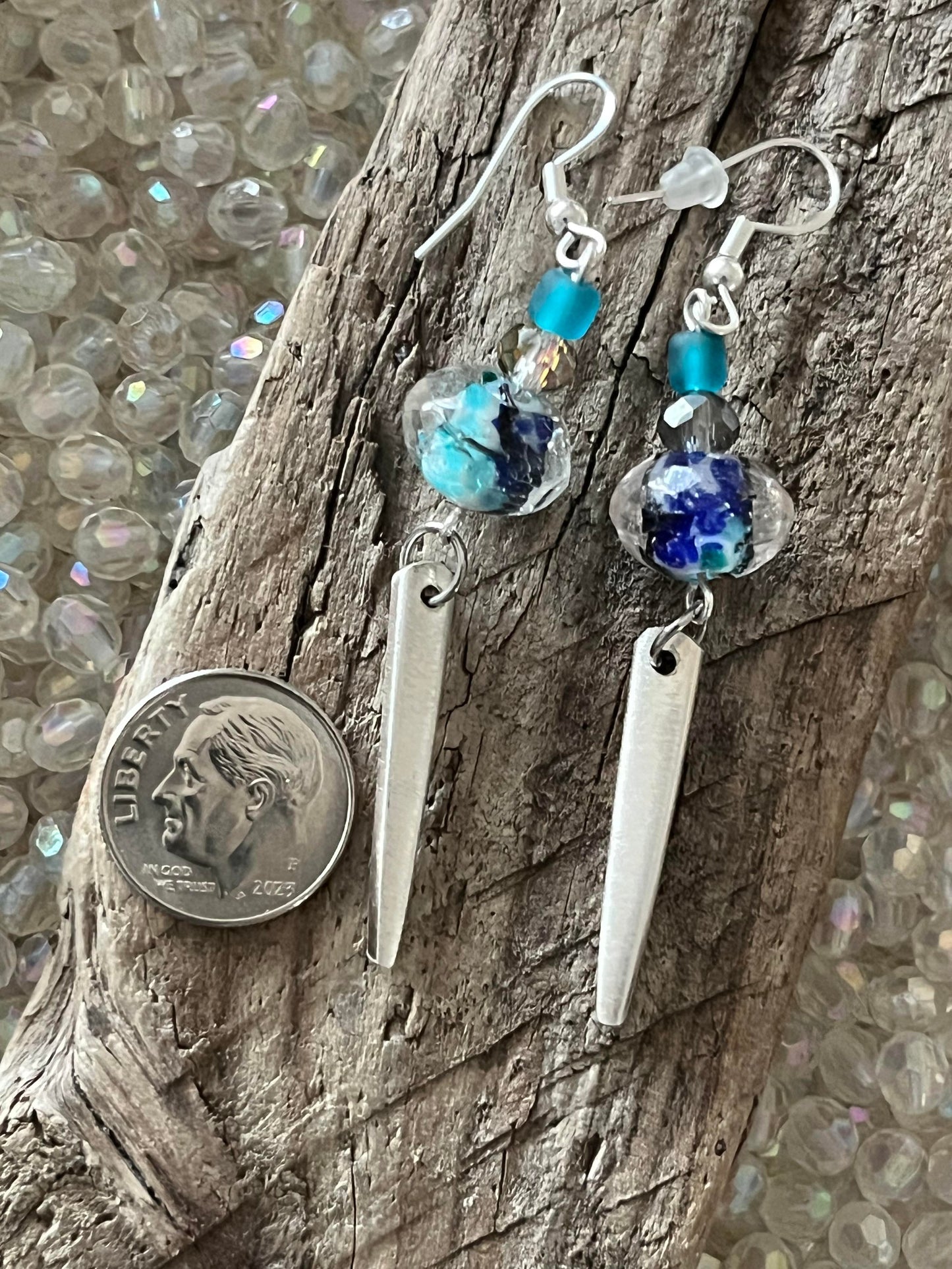 Earrings : Fork tines with beads.