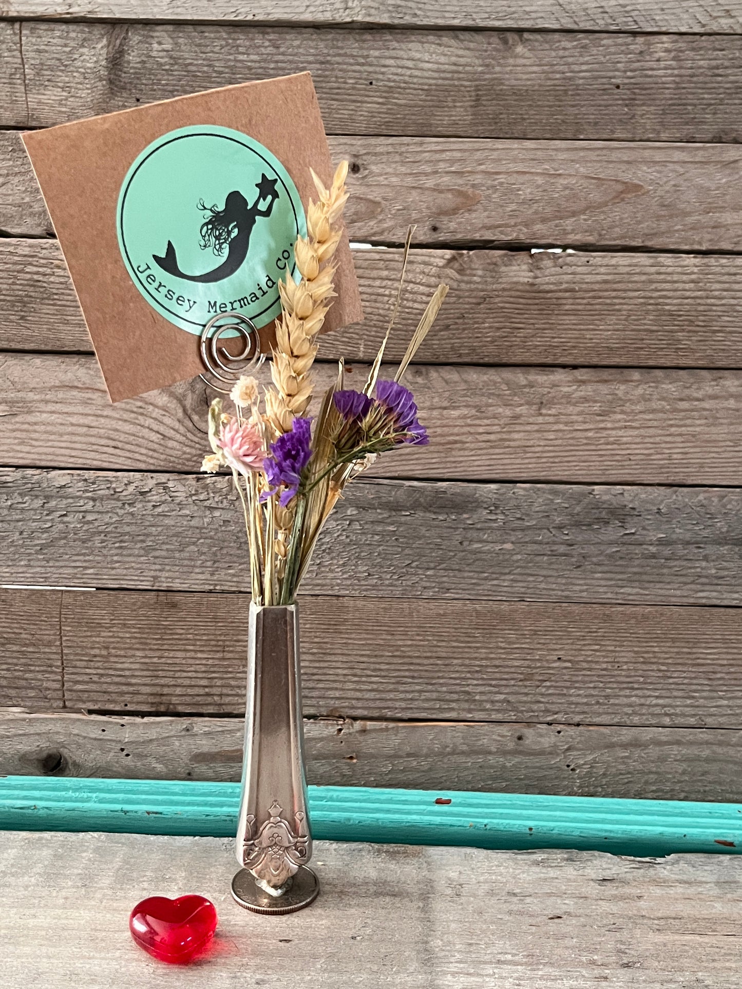 Bud Vase soldered onto a Quarter.  Pattern: Her Majesty , Vintage 1931