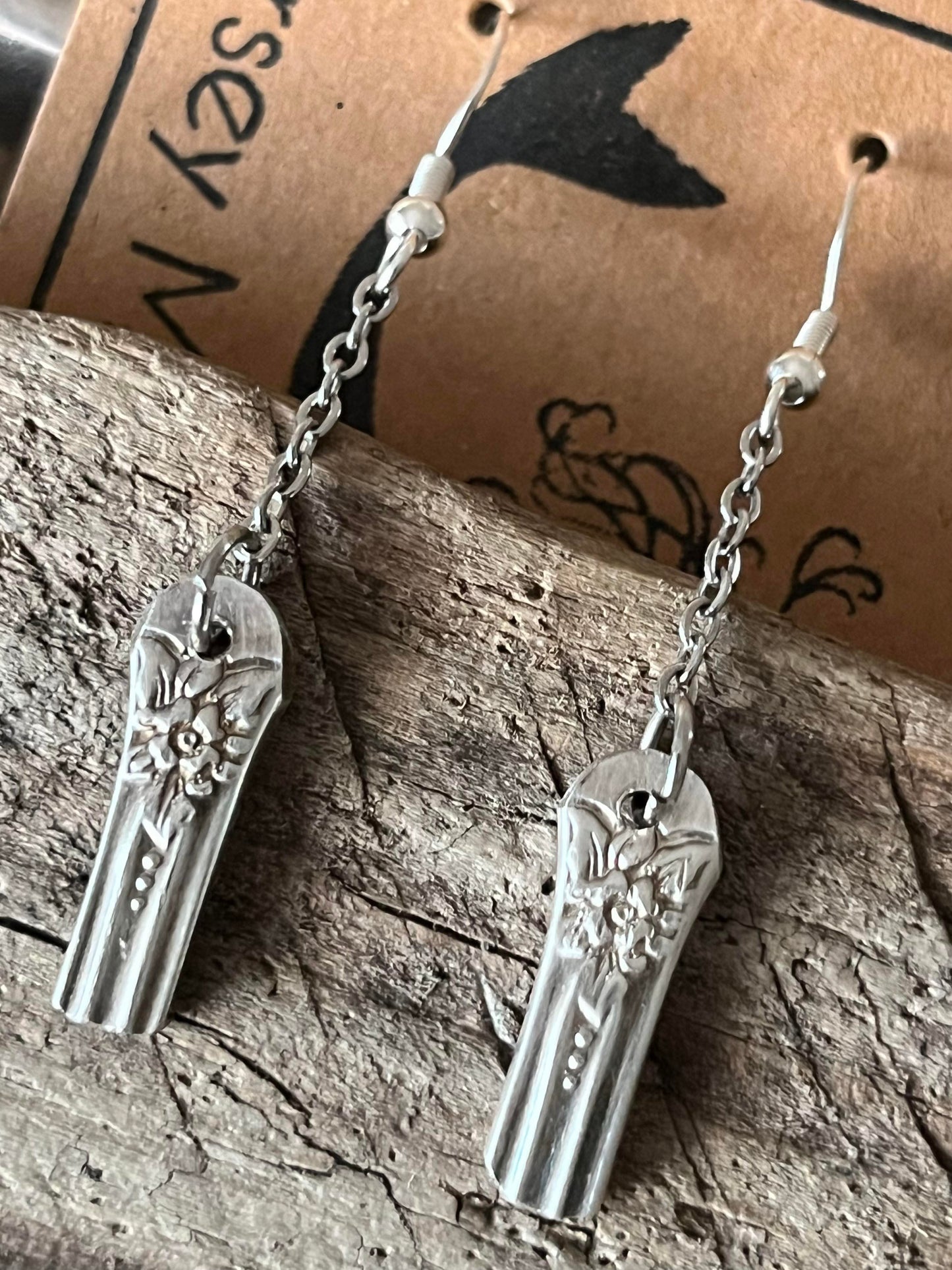 Earrings :  silverware on a stainless chain