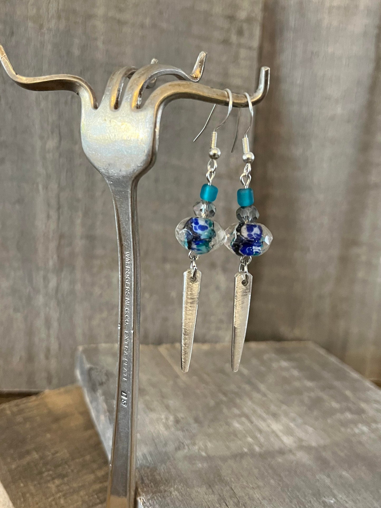 Earrings : Fork tines with beads.