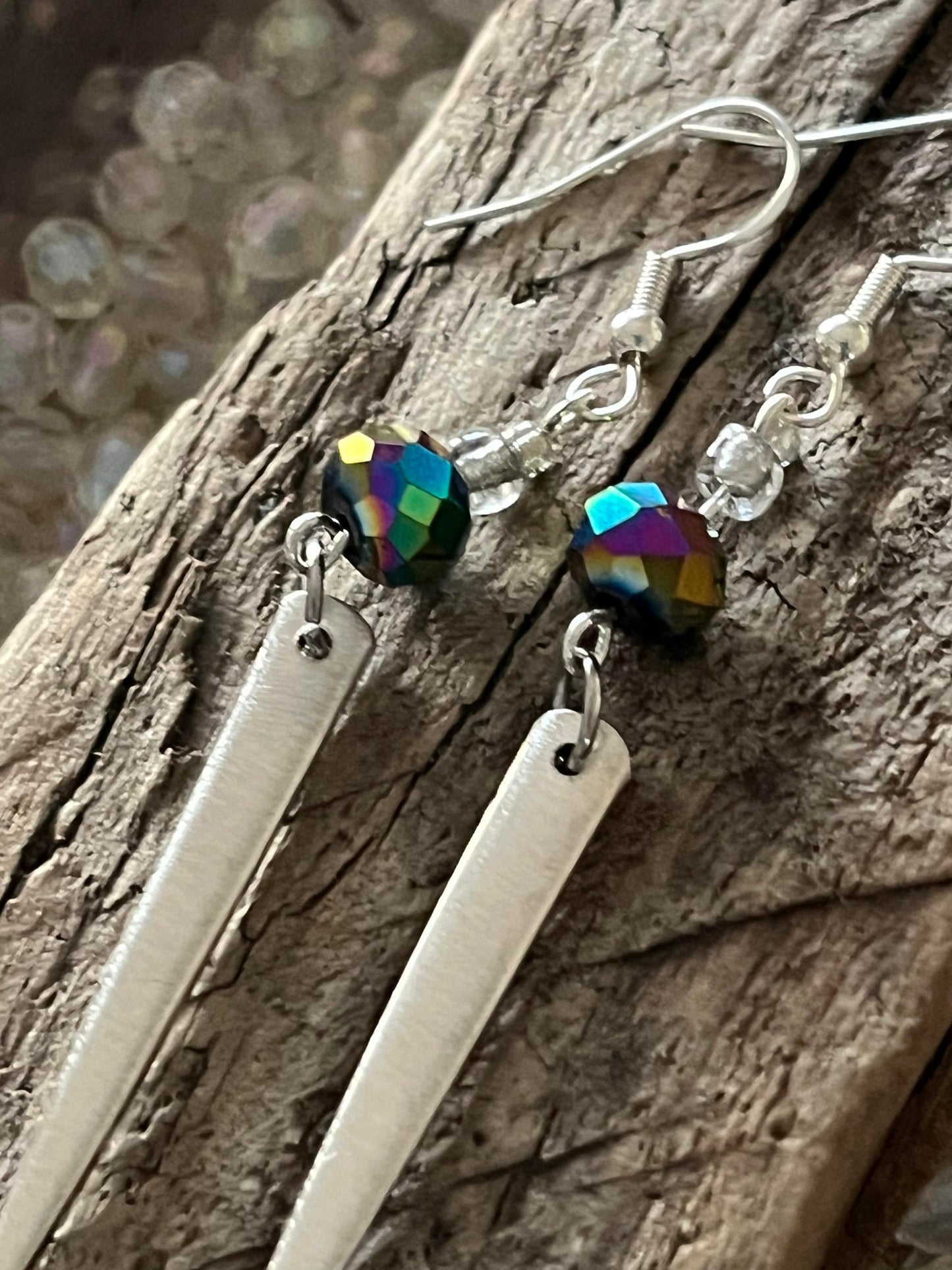 Earrings : Fork tines with beads.