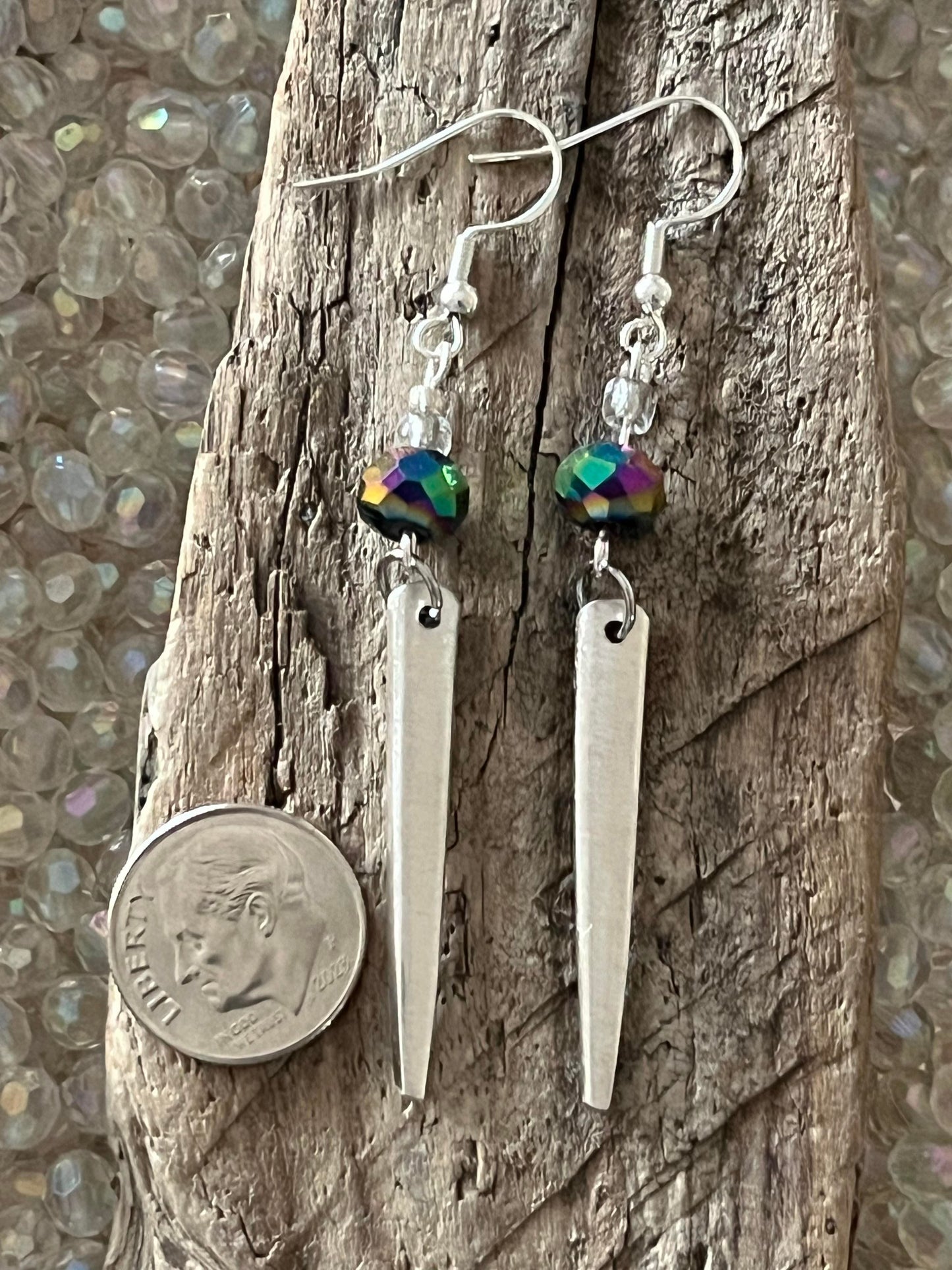 Earrings : Fork tines with beads.
